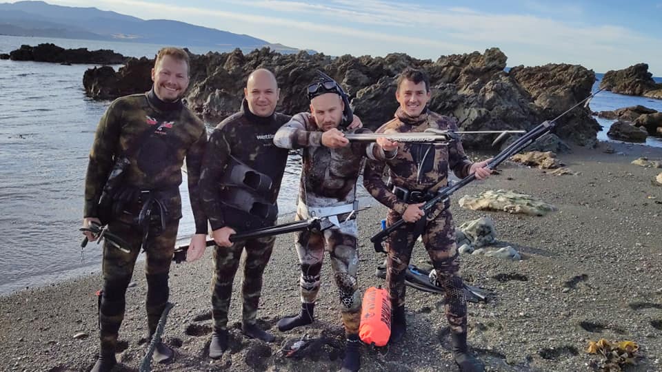 Johannes and friends spearfishing at "Shark's Tooth", Lyall Bay, Wellington